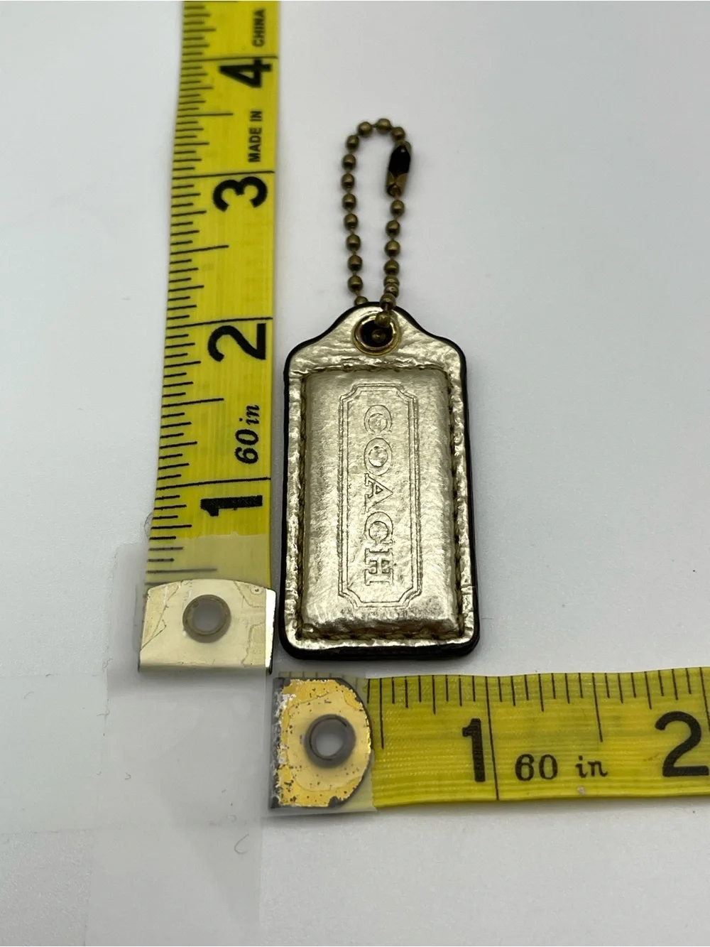 Coach Metallic Gold Leather Hang Tag